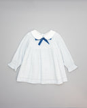 Vestido azul de algodón vichy con cuello blanco y lazo de terciopelo