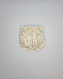 Cubrepañal beige de viella estampada floral, rematada con ondulina a contraste