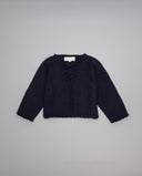 Navy knit cardigan with two small metallic contrast bows