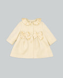 Beige wool blend coat with ruffle collar and velvet bows