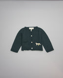 Chaqueta de tricot con lazo metalizado y botón de nácar inicial