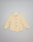 Camisa niño beige de algodón con cuello y botones de madera