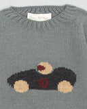 Jersey verde jade de lana merino con intarsia de coche