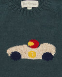 Jersey verde de lana merino con intarsia de coche