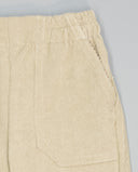 Pantalón niño beige de pana con bolsillos plastrón
