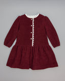 Vestido granate de pana con guipur en escote y delantero