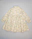 Vestido beige de viella floral con volantes y lazada en cuello