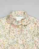 Vestido beige de viella floral con volantes y lazada en cuello