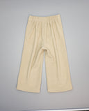 Pantalón de niña en pana con bolsillos plastrón y ondulina