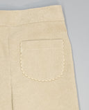 Pantalón de niña en pana con bolsillos plastrón y ondulina