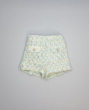 Short niña verde de tweed con carteritas y botones dorados