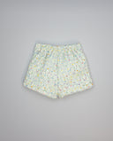 Short niña verde de tweed con carteritas y botones dorados