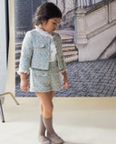 Short niña verde de tweed con carteritas y botones dorados