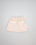 Falda rosa fruncida de tweed con cinta de mohair beige