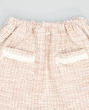 Falda rosa fruncida de tweed con cinta de mohair beige