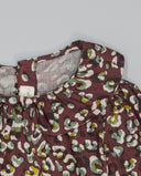 Camisa niña granate animal print con cuello fruncido y lazo