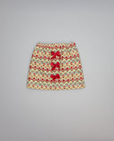 Falda fruncida de jacquard tapicero con lazos de terciopelo