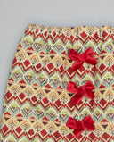 Falda fruncida de jacquard tapicero con lazos de terciopelo