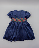 Vestido azul marino de terciopelo con manga farol y lazada