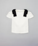 Camisa niña beige de algodón estructurado con lazos de terciopelo negro