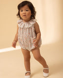 Baby romper with floral print and ruffle neckline