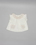 Baby plumeti blouse with pockets and contrast floral print