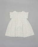 Vestido bebé niña blanco estampado floral azul, mangas volante y botones traseros nacarados