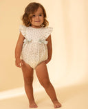 Baby romper with floral print and side bows