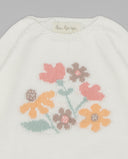Jersey bebé Fina Ejerique blanco punto algodón con estampado floral jacquard en rosa, naranja y marrón