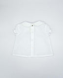 Blusa bebé blanca plumeti manga farol con cuello bebé de encaje y botones nacarados vista trasera