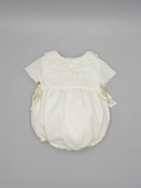 Romper with lace inserts and satin side bows