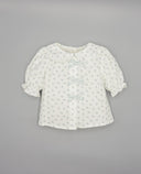 Printed blouse with front bows and puff sleeves