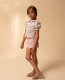 Printed blouse with front bows and puff sleeves