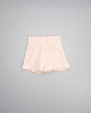 Short vichy de cuadros rosa y blanco para niña con cintura elástica y volante con encaje en el bajo