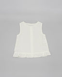 Blusa de lino blanca sin mangas para niña con volante en el bajo y botones nácar, corte amplio