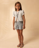 Piqué blouse with puff sleeves and lace trim