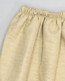 Falda lamé beige dorado con cintura elástica fruncida, tejido brillante texturizado, corte holgado