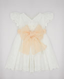 Vestido plumeti bordado con cenefas y lazada