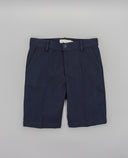 Tailored structured shorts with welt pockets and adjustable waist