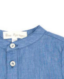 Camisa niño Fina Ejerique denim azul cuello mao con botones blancos manga larga